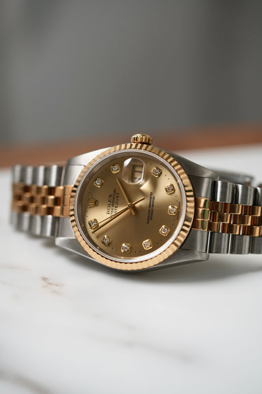 1996 Rolex Datejust Ref. 16233 – Champagne Big Diamond